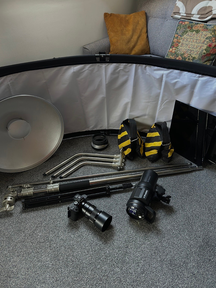 Studio equipment laid out for the portrait